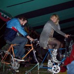 The Buddhist tent at the downpour Thursday night. Keeping the lights on. 2008