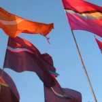 Flags blowing in formation to the cool breeze of thursday evening